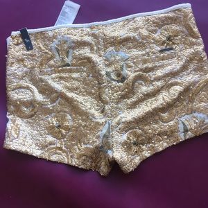 White & gold sequin shorts